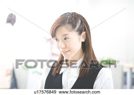 Stock Photo - Young woman in uniform. Fotosearch