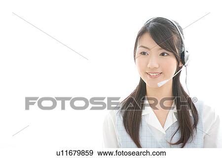Young woman wearing headset View Large Photo Image Stock Photo - Young woman wearing headset. Fotosearch