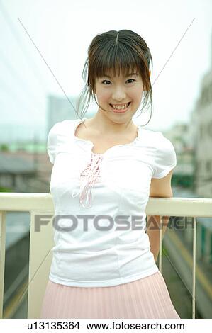 Portrait of young woman View Large Photo Image Picture - Portrait of young woman. Fotosearch