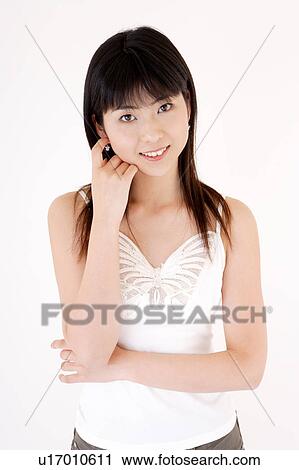 Stock Image - Portrait of young woman. Fotosearch