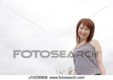 Stock Photo - Portrait of young woman. Fotosearch