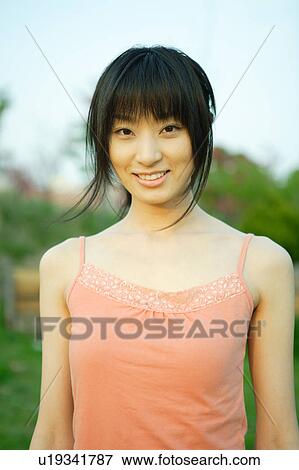 Portrait of young woman View Large Photo Image Stock Photo - Portrait of young woman. Fotosearch