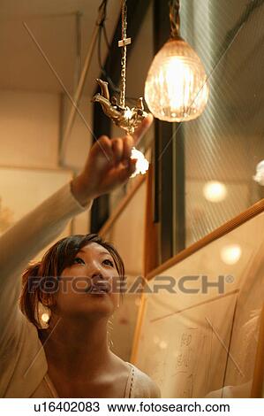 Young woman shopping View Large Photo Image Stock Image - Young woman shopping. Fotosearch