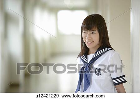 Stock Photo - High school girl in school corridor. Fotosearch