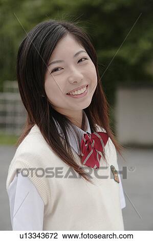 Stock Image - High school girl smiling. Fotosearch