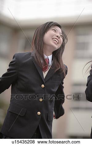Stock Photo - High school girl smiling. Fotosearch
