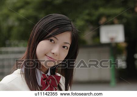 Stock Photography - High school girl smiling. Fotosearch