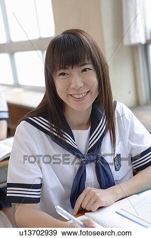 Stock Photo - High school girl studying. Fotosearch