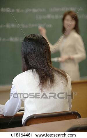 Rear view of high school girl studying View Large Photo Image Stock Image - Rear view of high school girl studying. Fotosearch