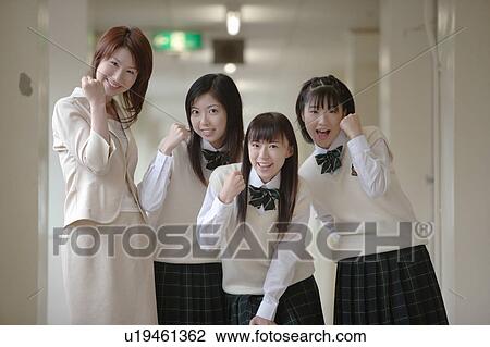 Three high school girls and female teacher smiling View Large Photo Image Stock Image - Three high school girls and female teacher smiling. Fotosearch