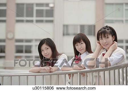 Three high school girls leaning on railing View Large Photo Image Stock Photograph - Three high school girls leaning on railing. Fotosearch