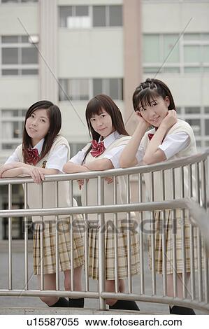 Three high school girls leaning on railing View Large Photo Image Stock Photography - Three high school girls leaning on railing. Fotosearch