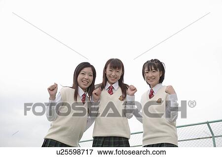 Three high school girls smiling View Large Photo Image Stock Photo - Three high school girls smiling. Fotosearch