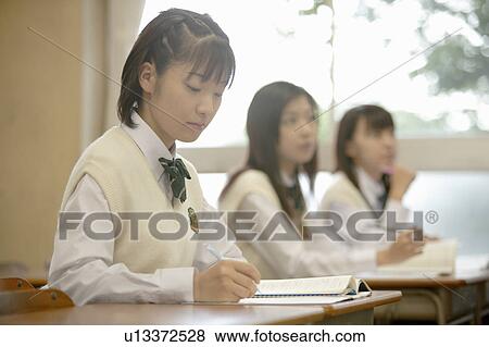 Three high school girls studying View Large Photo Image Stock Photo - Three high school girls studying. Fotosearch
