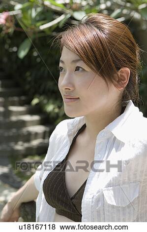 Stock Photo - Young woman in bikini. Fotosearch