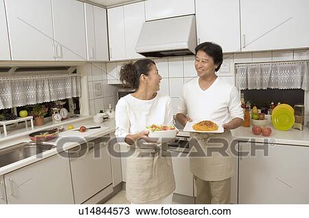 Mature couple cooking View Large Photo Image Stock Image - Mature couple cooking. Fotosearch