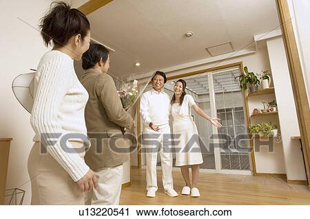 Two mature couples greeting View Large Photo Image Stock Image - Two mature couples greeting . Fotosearch