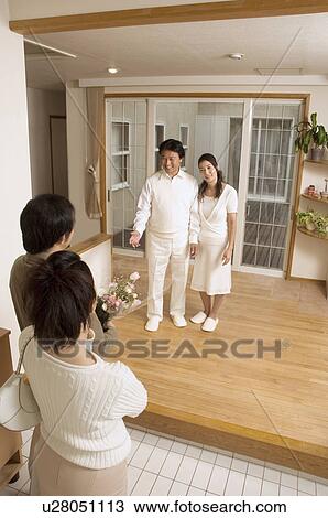 Two mature couples greeting View Large Photo Image Stock Image - Two mature couples greeting . Fotosearch