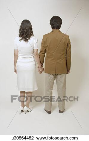 Mature couple holding hands View Large Photo Image Stock Image - Mature couple holding hands. Fotosearch
