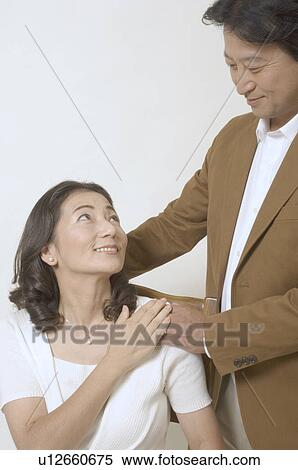 Mature couple looking at each other View Large Photo Image Stock Photography - Mature couple looking at each other. Fotosearch