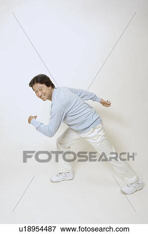 Mature man in starting position View Large Photo Image Stock Photo - Mature man in starting position. Fotosearch