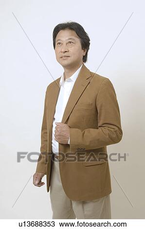 Mature man standing View Large Photo Image Stock Image - Mature man standing. Fotosearch