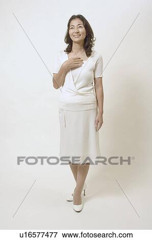 Stock Photo - Mature woman standing. Fotosearch