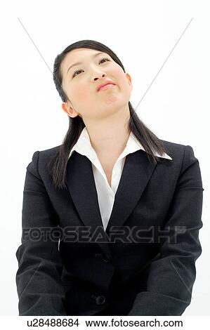 Picture - Young woman looking annoyed. Fotosearch