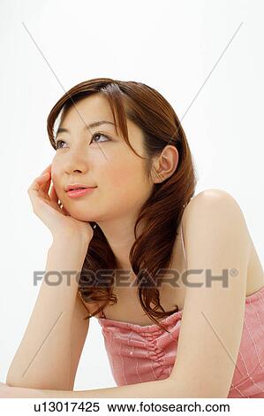 Young woman smiling View Large Photo Image Stock Photography - Young woman smiling. Fotosearch