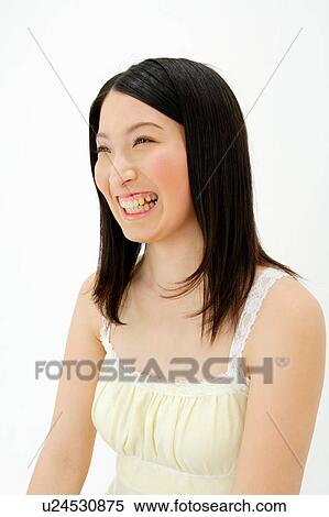 Young woman smiling View Large Photo Image Stock Photography - Young woman smiling. Fotosearch