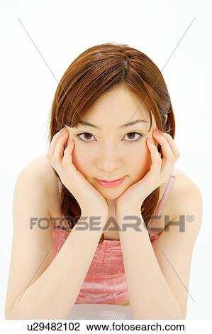 Young woman thinking View Large Photo Image Stock Image - Young woman thinking. Fotosearch