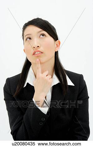 Young woman thinking View Large Photo Image Stock Photography - Young woman thinking. Fotosearch