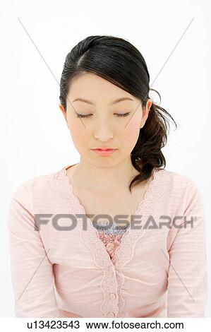 Young woman with eyes closed View Large Photo Image Stock Image - Young woman with eyes closed. Fotosearch