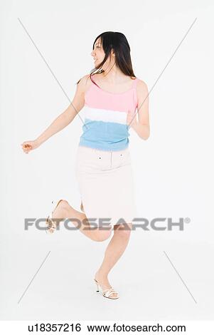 Young woman running View Large Photo Image Stock Photograph - Young woman running. Fotosearch