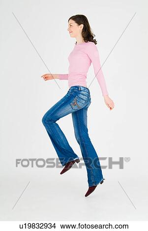 Young woman skipping View Large Photo Image Picture - Young woman skipping. Fotosearch