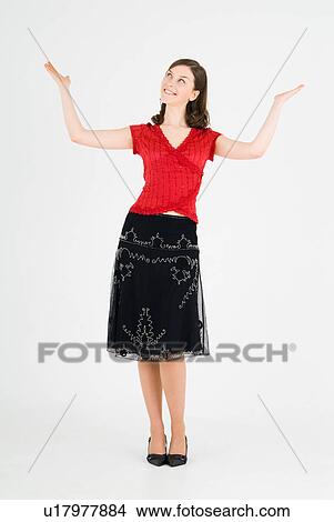 Young woman standing View Large Photo Image Picture - Young woman standing. Fotosearch