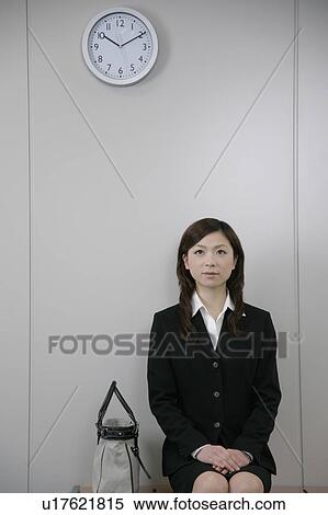 Stock Photography - A young woman waiting for job interview. Fotosearch