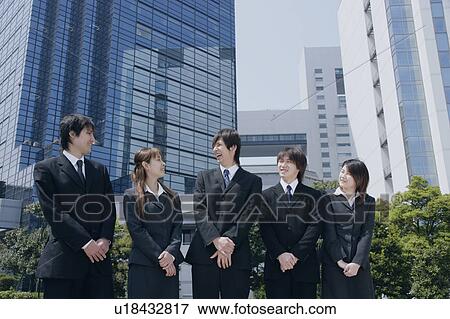 Stock Photo - Five young businessperson smiling. Fotosearch
