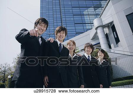 Stock Photo - Five young businessperson smiling. Fotosearch
