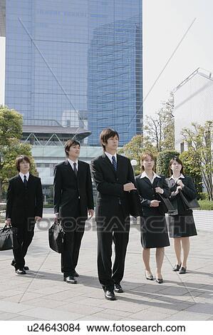 Picture - Five young businessperson standing. Fotosearch