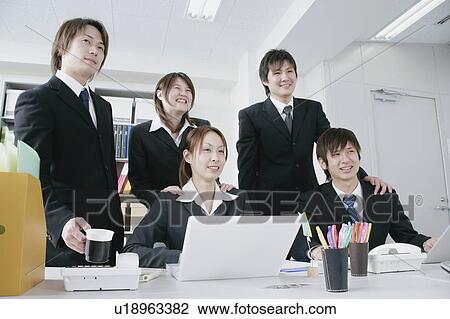 Five young businessperson working View Large Photo Image Stock Image - Five young businessperson working. Fotosearch