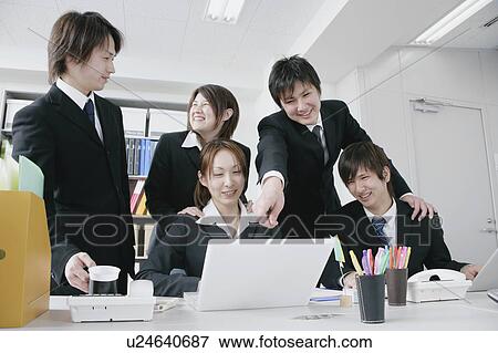 Stock Photo - Five young businessperson working. Fotosearch