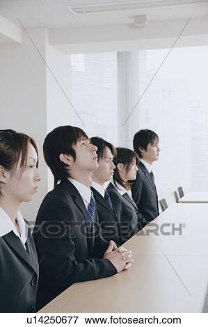 Stock Photo - Five young people waiting for job interview. Fotosearch
