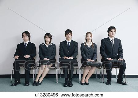 Five young people waiting for job interview View Large Photo Image Stock Photograph - Five young people waiting for job interview. Fotosearch