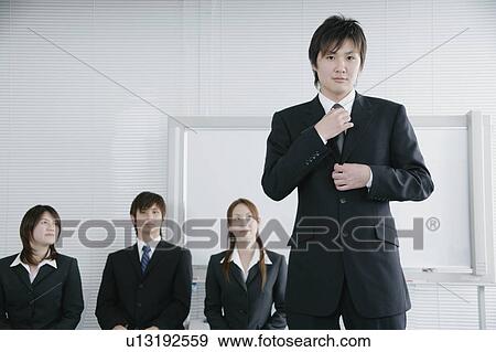 Four young people having job interview View Large Photo Image Stock Photo - Four young people having job interview. Fotosearch