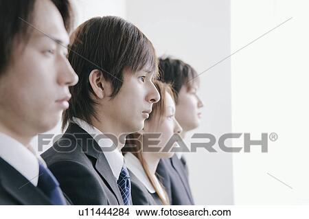 Picture - Four young people waiting for job interview. Fotosearch