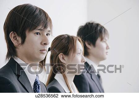 Three young people waiting for job interview View Large Photo Image Stock Image - Three young people waiting for job interview. Fotosearch