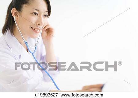 Stock Photo - A female doctor. Fotosearch