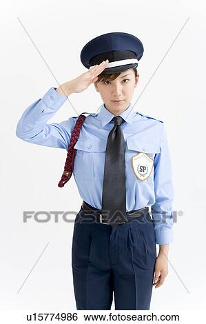 A female security guard saluting View Large Photo Image Stock Photograph - A female security guard saluting. Fotosearch