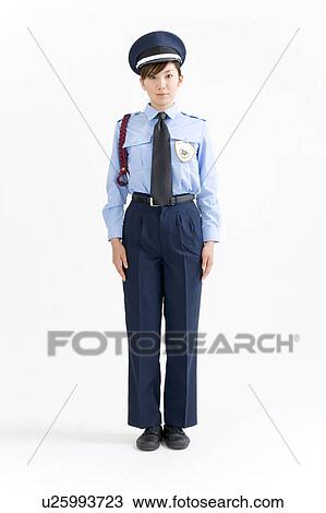 A female security guard standing View Large Photo Image Stock Image - A female security guard standing. Fotosearch